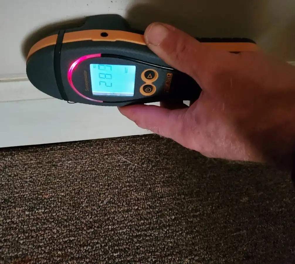 Moisture detection at baseboard during Storm Damage Restoration in Middleborough